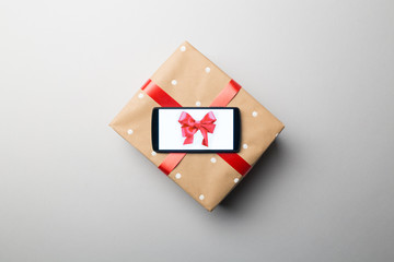 Christmas Gift with gift bow on Device display
