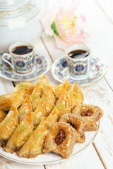  traditional eastern desserts on wooden background
