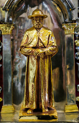 Obraz premium Statue of Father Damien in Mechelen Cathedral