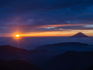 Mt.Fuji and the rising sun on Kitadake, Minami South Alps, Japan