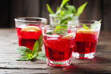Aperitif with campari, mint and lemon