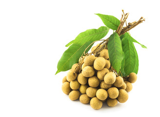 Bunch of longan, dimocarpus, with its leaves isolated over white