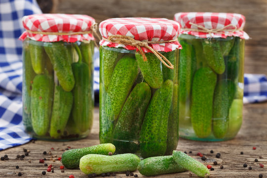 Pickled gherkins in jar, fermented food with spices