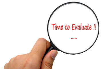 Time to Evaluate word. Magnifier and puzzles.