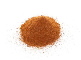 Heap of ground Cinnamon isolated on white