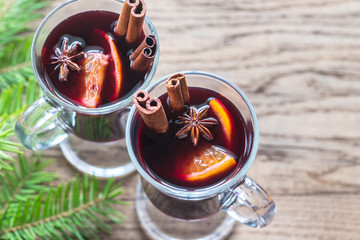 Two glasses of mulled wine with fir branch