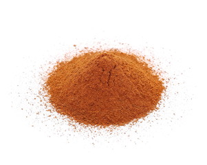 Heap of ground Cinnamon isolated on white
