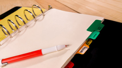 Notebook and pen ready to write the project.