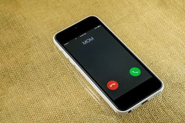 smartphone Incoming mother calls. The love that everyone gets .