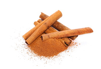 Cinnamon sticks and powder isolated on white background