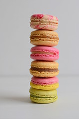 French colorful macarons with white background