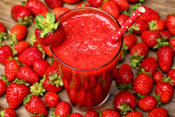 Glass of delicious strawberry milk shake, closeup