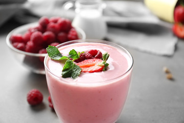 Glass of berry milk shake, closeup