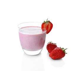 Glass of strawberry milk shake on white background