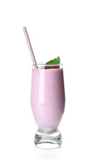 Glass of raspberry milk shake on white background