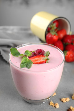 Glass of berry milk shake, closeup