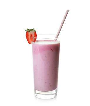 Glass of strawberry milk shake on white background