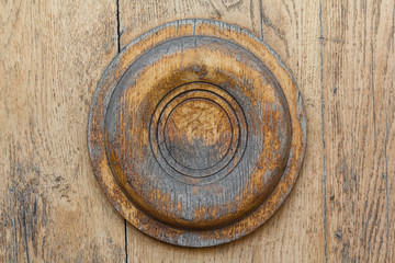 Fototapeta na wymiar Wood surface and a decorative element in the form of a circle. B