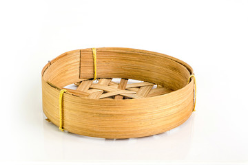 Bamboo Tray,Baskets for fish,Bamboo round container shape for steaming asian food, isolated on white background.