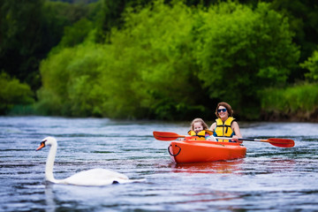 Mother and child in a kayak