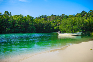 Boat on the beach. Vacation holidays background.  tropical beach