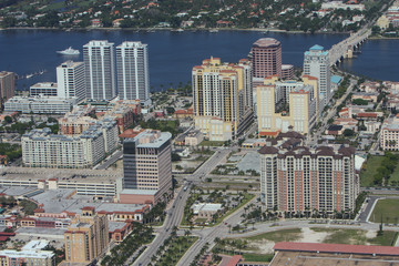 Aerial view of waterfront buildings roads and a bridge