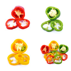 Sliced red yellow green pepper isolated on white