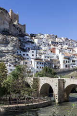 Obraz na płótnie Canvas Roman bridge, located in the central part of the town, Alcala del Jucar, Spain