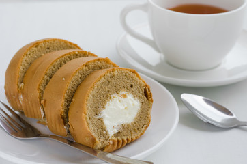 Coffee Cake Roll with A Cup of Tea On Tea Breaking Time.
