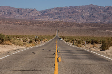 And endless road in Death Valley National Park, CA, USA