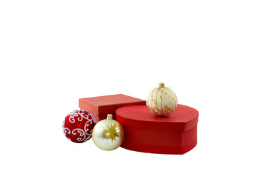 Christmas decoration isolated white. Red gifts boxes and three golden balls.