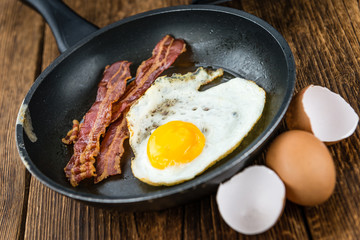 Wooden Table with Bacon and Eggs