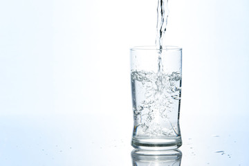 Pouring water in glass