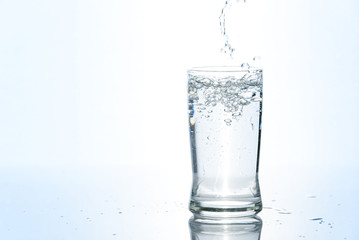 Pouring water in glass