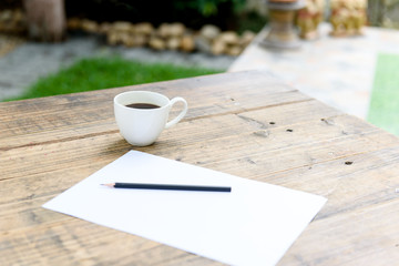 Paper pencil and coffee