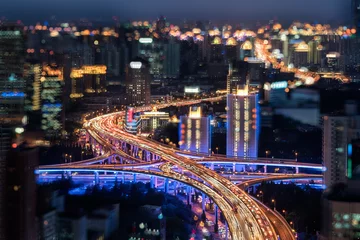 Zelfklevend Fotobehang modern city with highway interchange © YANG WEI CHEN 
