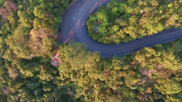 Aerial View Flight over the Mountains. Flying over the River. Forest Valley. Morning Fog. The road up the hill. Doi Suthep Chiangmai Thailand.