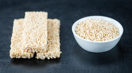 Slate slab with fresh made Quinoa Bars (selective focus)
