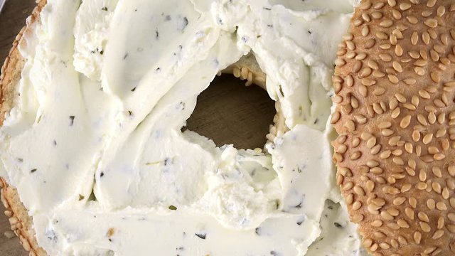 Rotating bun with Bagels with Cream Cheese as not loopable 4K UHD footage