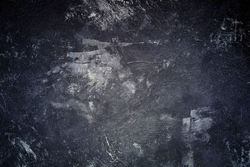 Abstract black background with luxurious vintage grunge background texture, elegant monochrome background with gray center for website template background or luxury brochure, distressed background