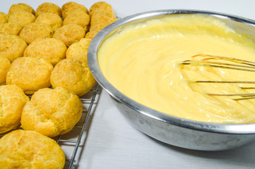Fresh eclairs and custard cream
