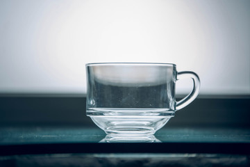 Close up picture of an empty transparent glass