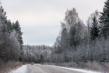 Obraz na płótnie Canvas road on a cold winter day