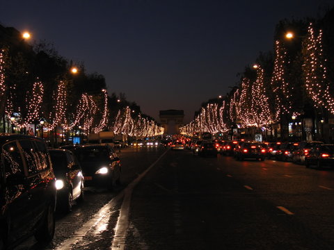 Arch of Triumph and Champs Elysees with Christmas festive illumination. Paris in winter. 2