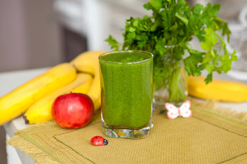 Green cocktail on table