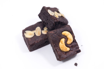 Pile of brownies isolated on white. brownies on white background. brownies almond.
