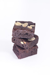 Pile of brownies isolated on white. brownies on white background. brownies almond.