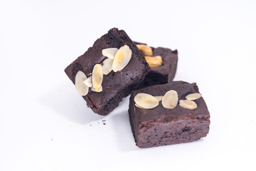 Pile of brownies isolated on white. brownies on white background. brownies almond.