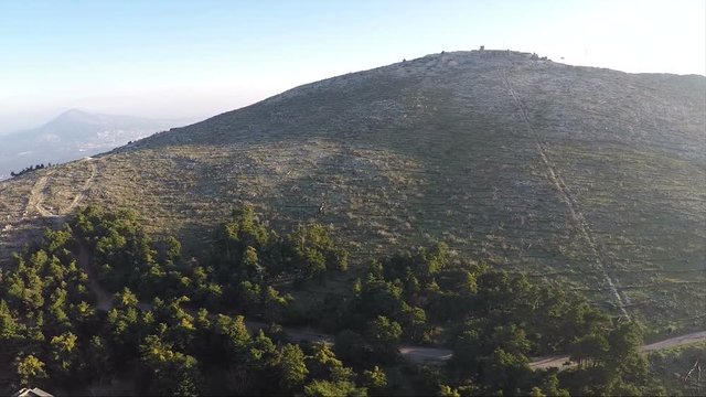 Aerial view of an old abandoned building on the mountain.