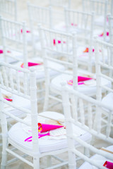 Fototapeta na wymiar Chair setting for Wedding on the beach.
